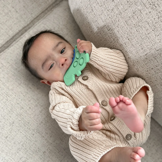 Itzy Pop™ Sensory Popper Toy | Dino